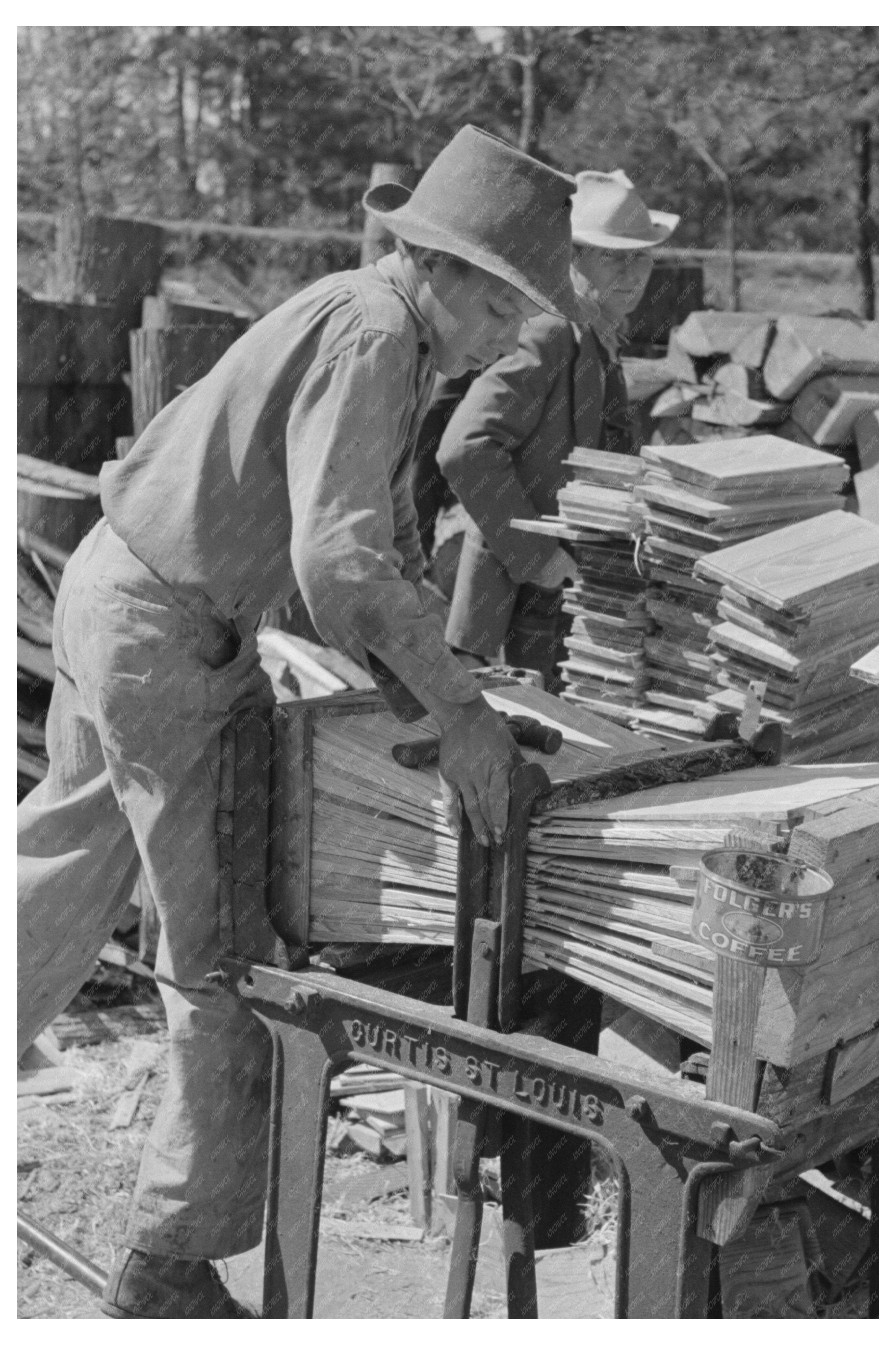 Young Boy Packing Shingles in Jefferson Texas April 1939