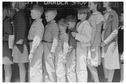 Schoolchildren in line for a movie San Augustine Texas 1939