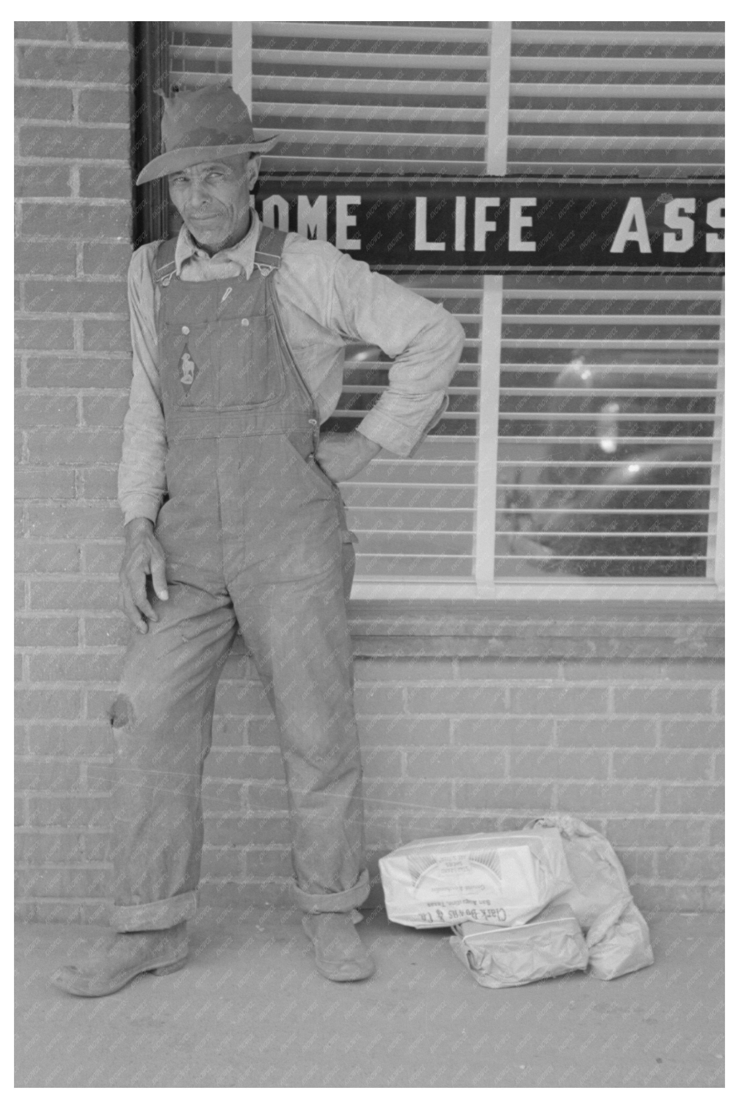 Farmer with Supplies in San Augustine Texas 1939