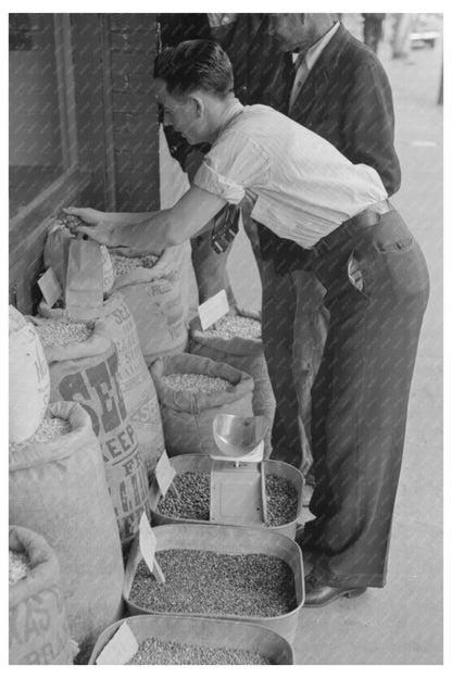 San Augustine Texas Clerk Putting Up Seed April 1939