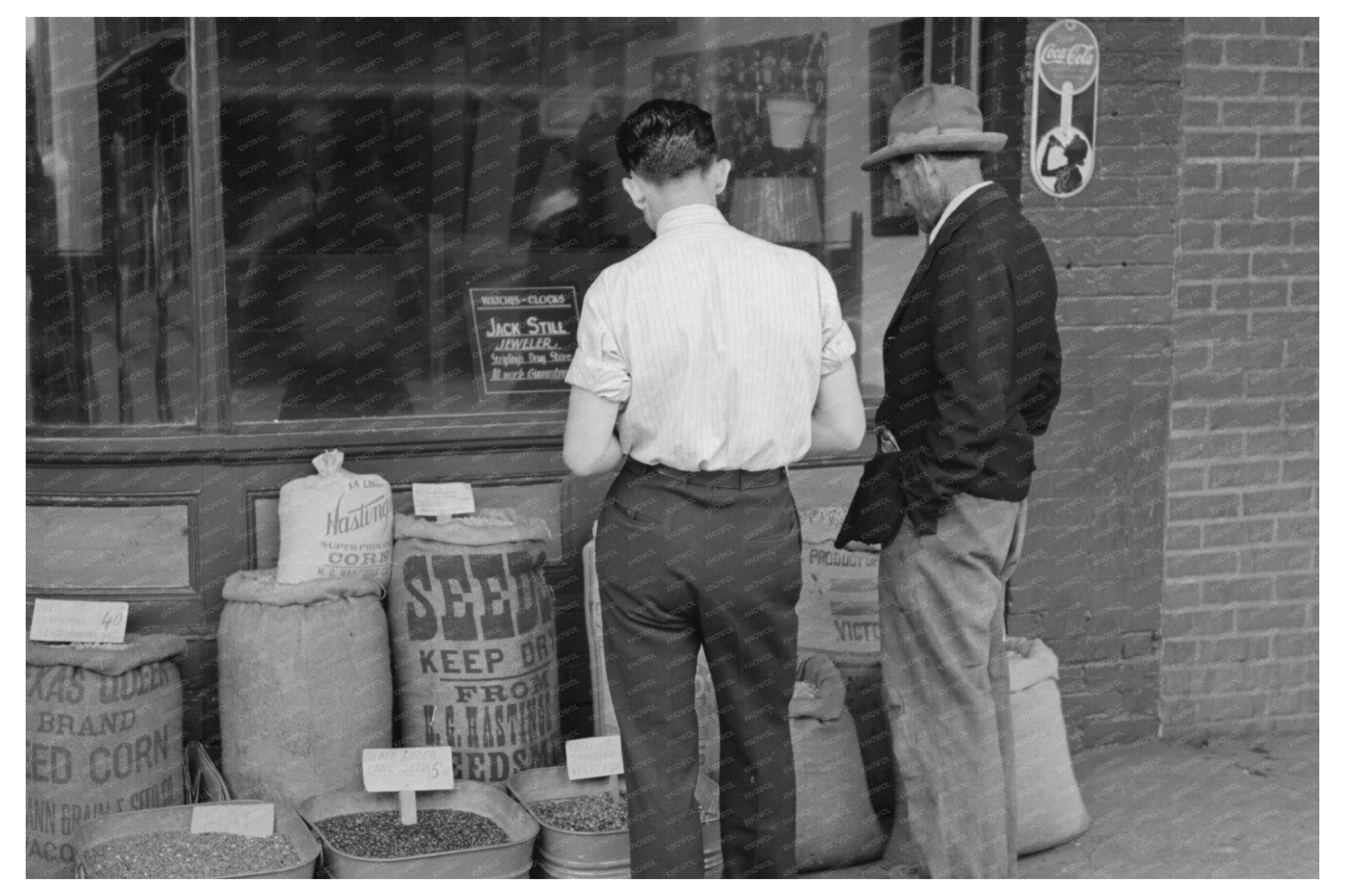 Clerk and Farmer Examine Seed in San Augustine Texas 1939