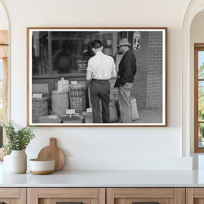 Clerk and Farmer Examine Seed in San Augustine Texas 1939