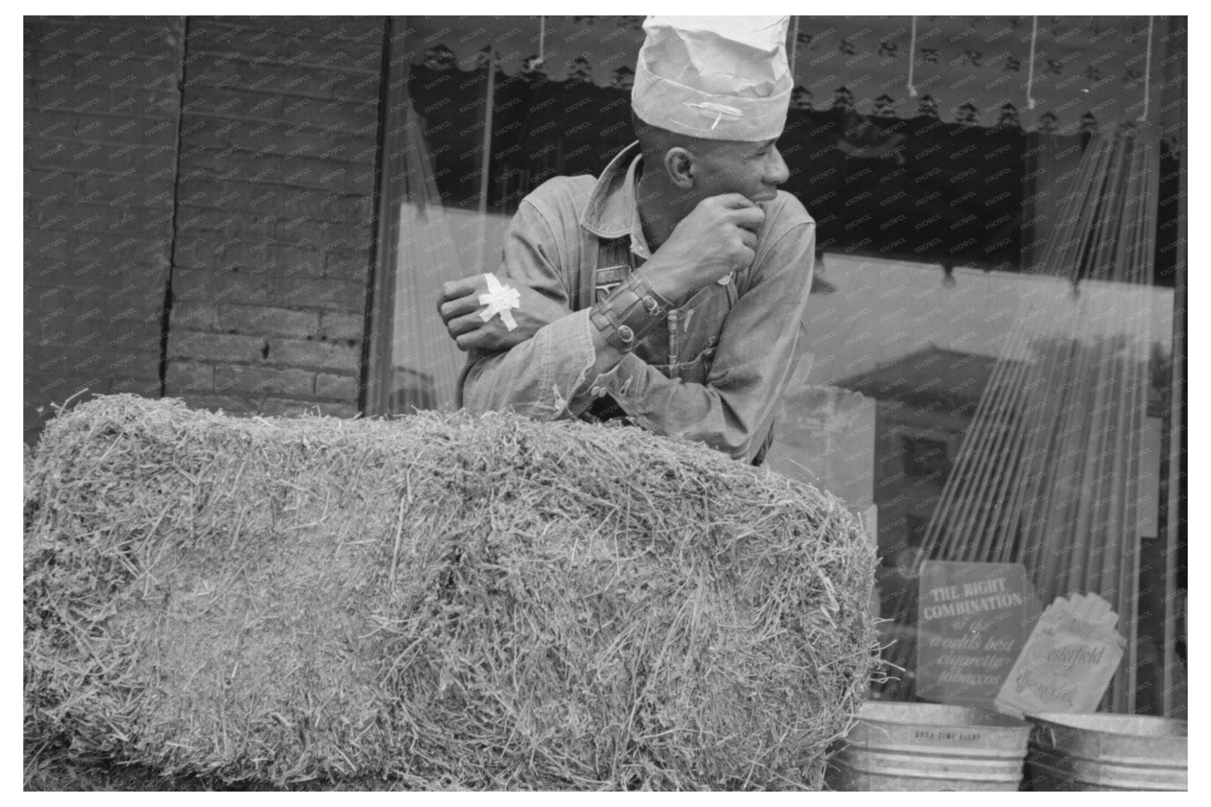 Man Leaning on Hay Bale San Augustine Texas 1939