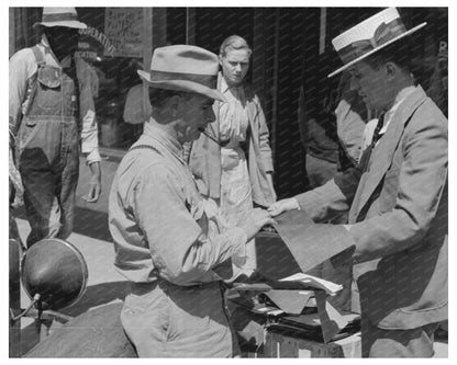 Salesman Shows Suit Material to Farmer in Hammond 1939