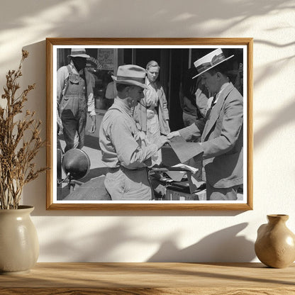 Salesman Shows Suit Material to Farmer in Hammond 1939