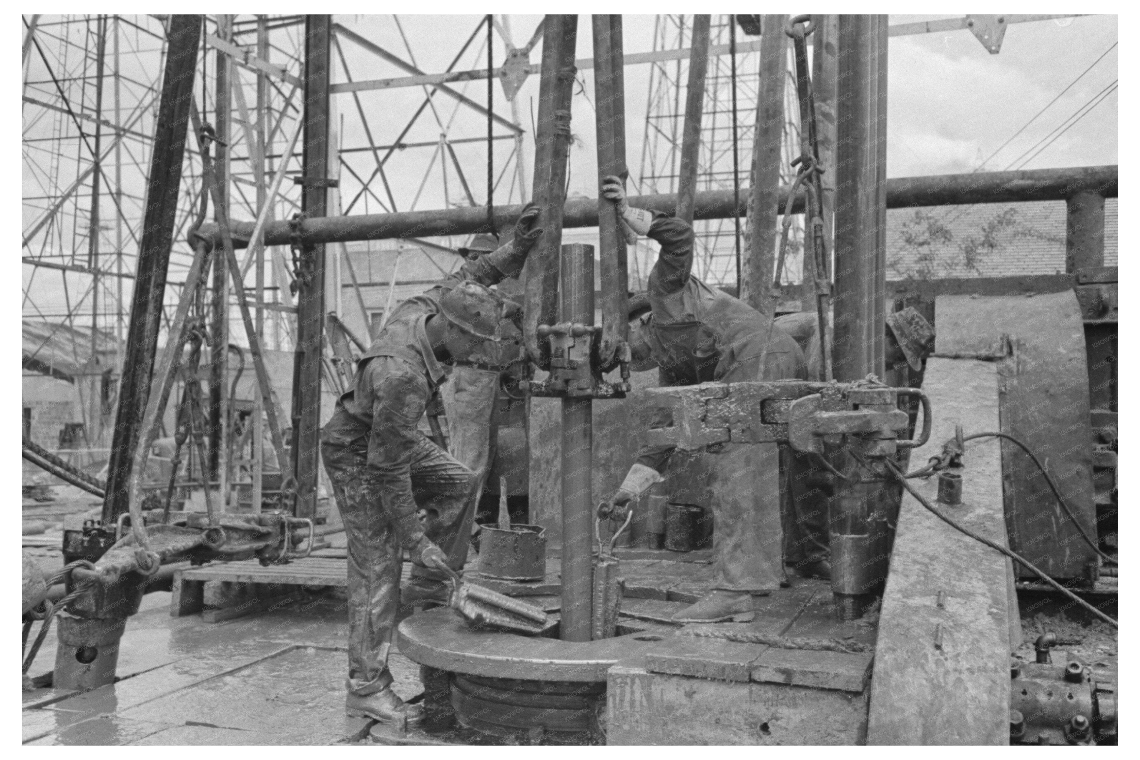 Kilgore Texas Oil Workers Removing Pipe 1939