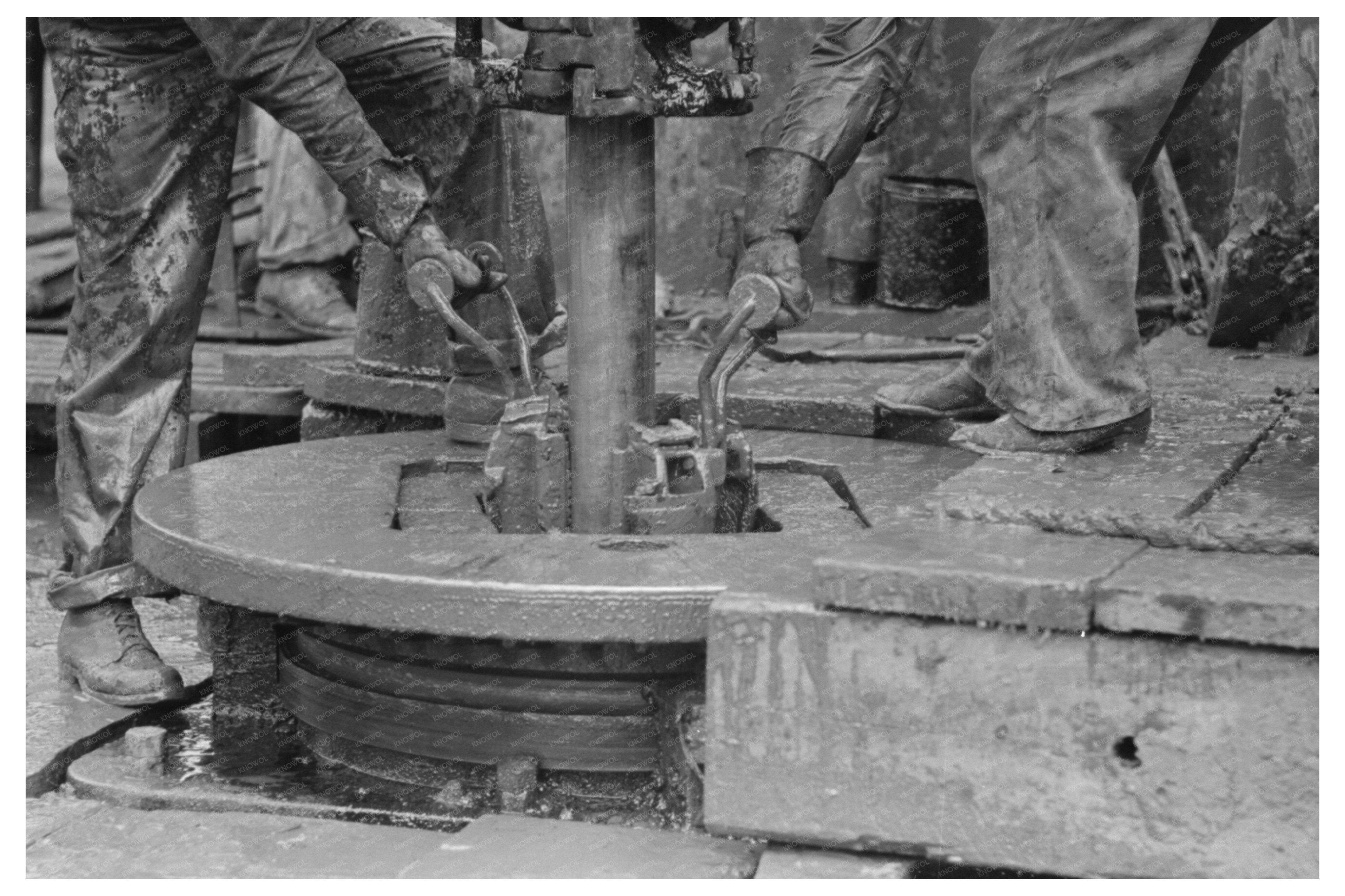 Workers Removing Clamps at Kilgore Texas Oil Well 1939