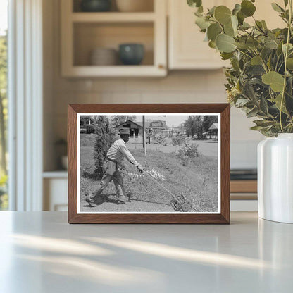 Man Mowing Lawn in San Augustine Texas 1939