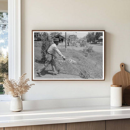 Man Mowing Lawn in San Augustine Texas 1939