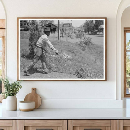 Man Mowing Lawn in San Augustine Texas 1939