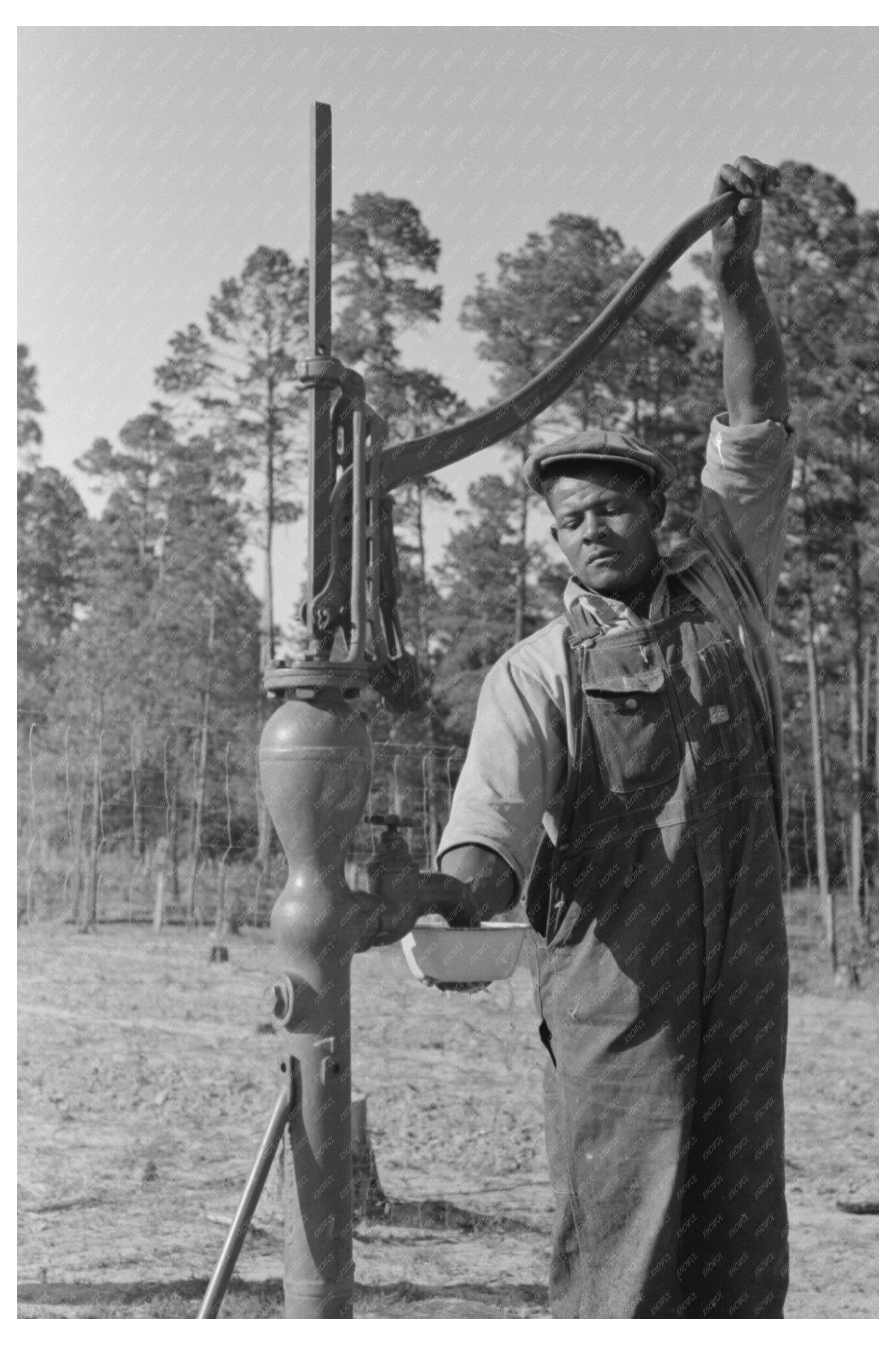 Farm Security Administration Client Pumping Water 1939