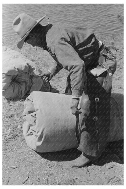 Cowboy Tying Bedroll at Walking X Ranch May 1939