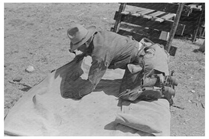 Cowboy Prepares Bedroll at Walking X Ranch May 1939