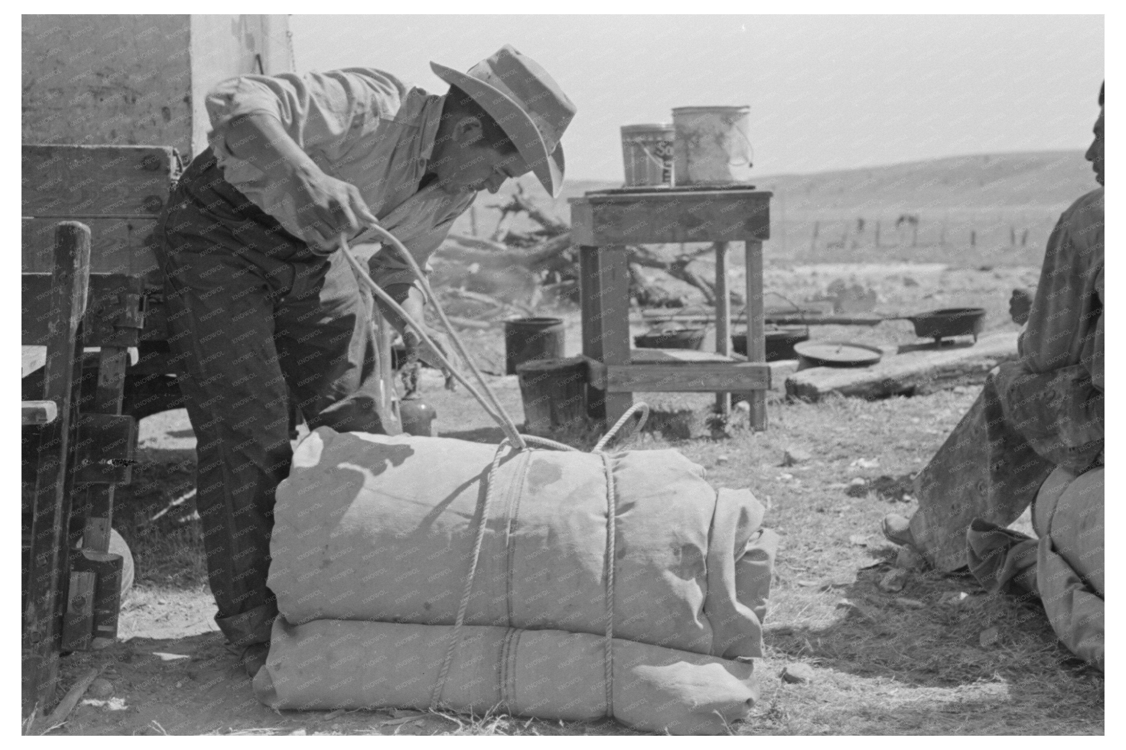 Cowboy Tying Bedroll on Cattle Ranch in Marfa Texas 1939