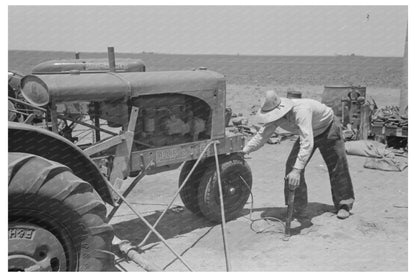 Day Laborer Pumps Air into Tractor Tire Ralls Texas 1939