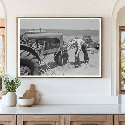 Day Laborer Pumps Air into Tractor Tire Ralls Texas 1939