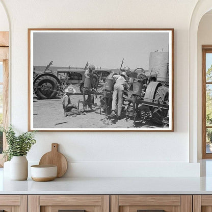 Day Laborer Changing Plow Points on Farm Tractor May 1939