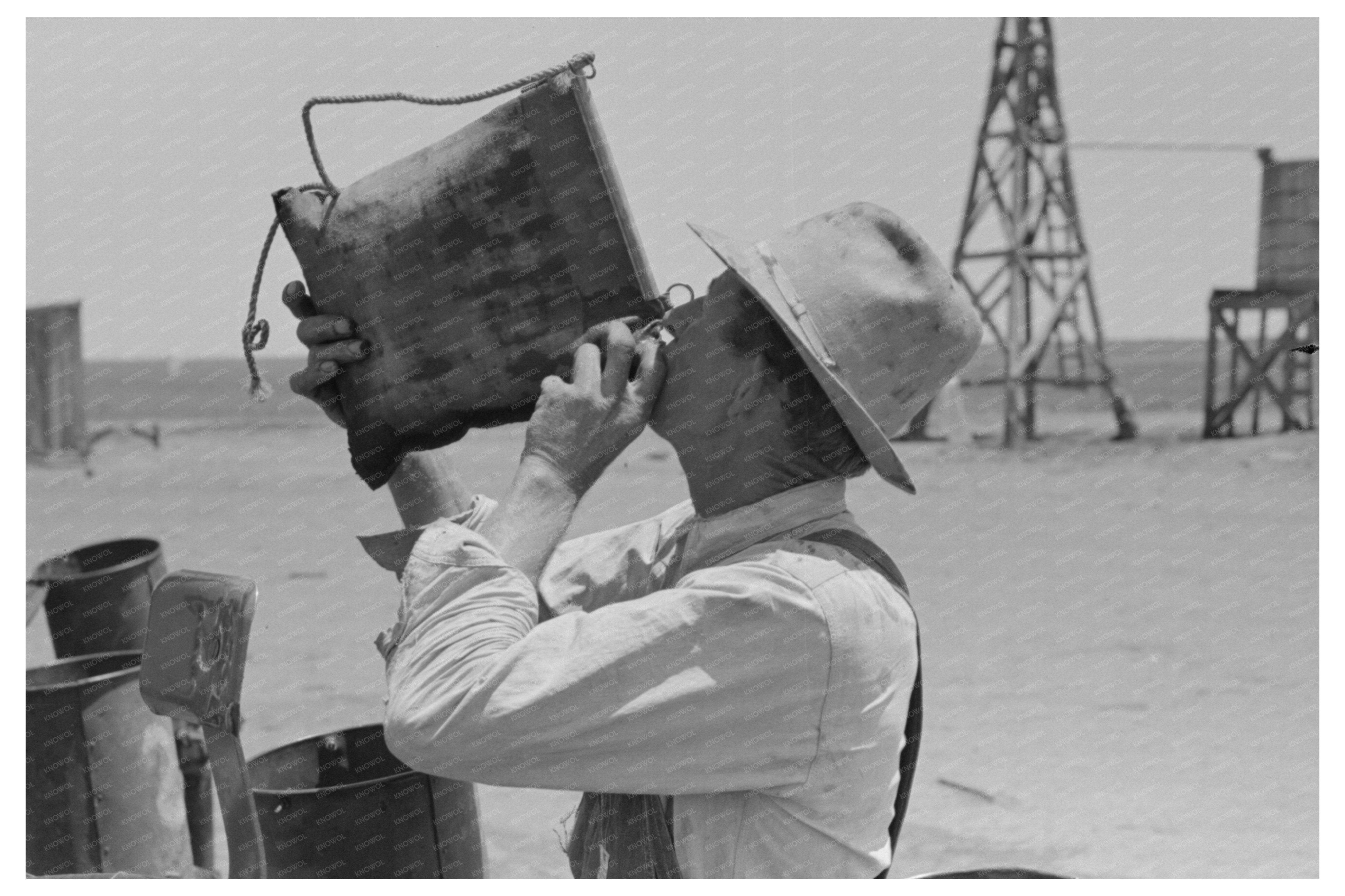 Day Laborer Drinking from Water Bag Ralls Texas May 1939