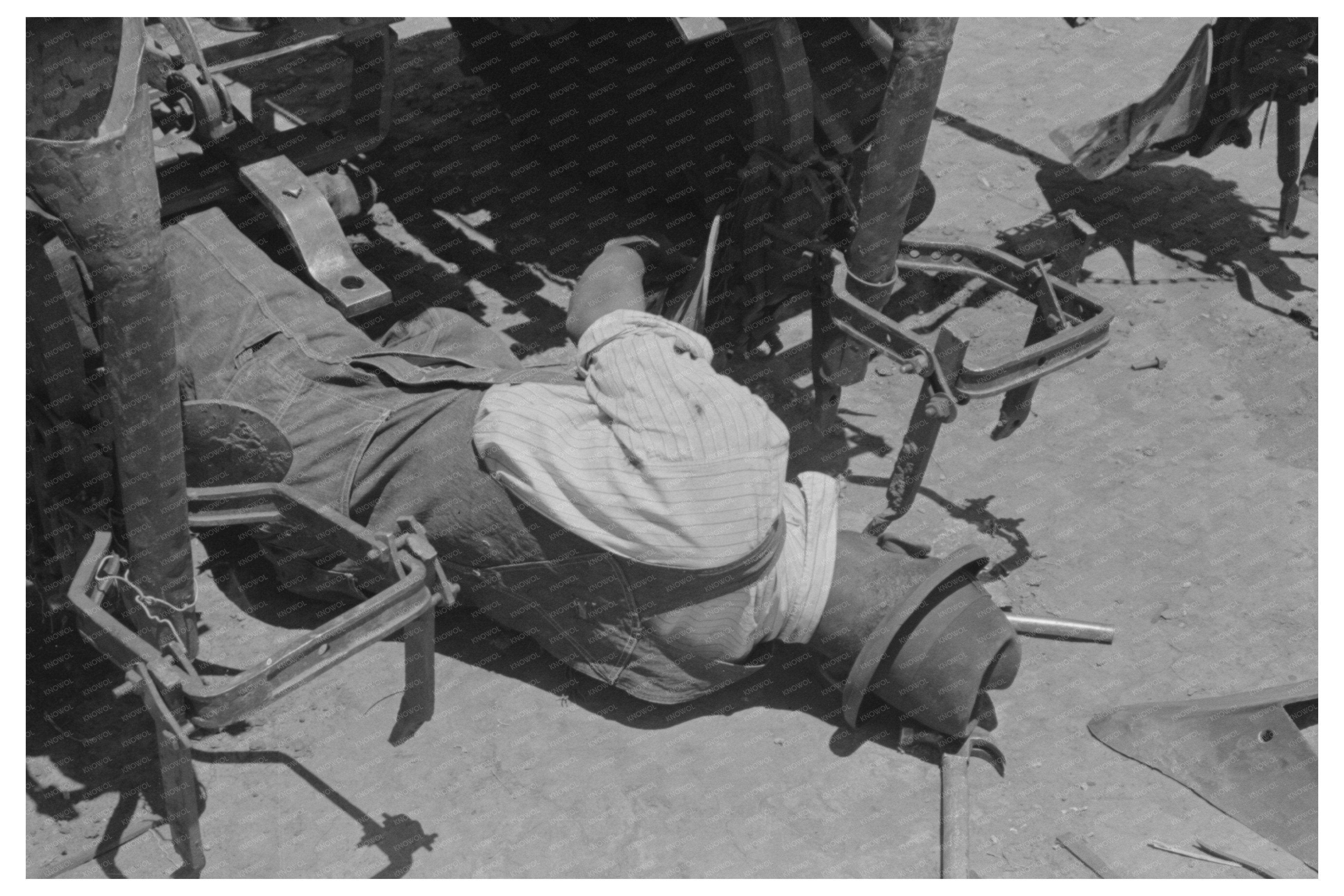 Farm Workers Adjusting Tractor Planter May 1939