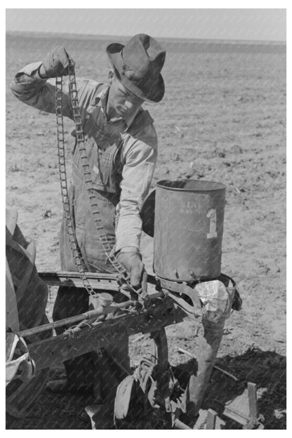 Day Laborer Attaching Chain to Planter in Ralls Texas 1939