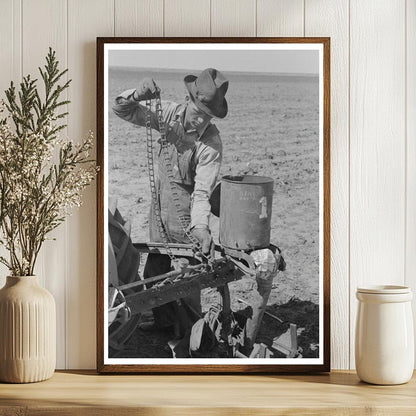 Day Laborer Attaching Chain to Planter in Ralls Texas 1939