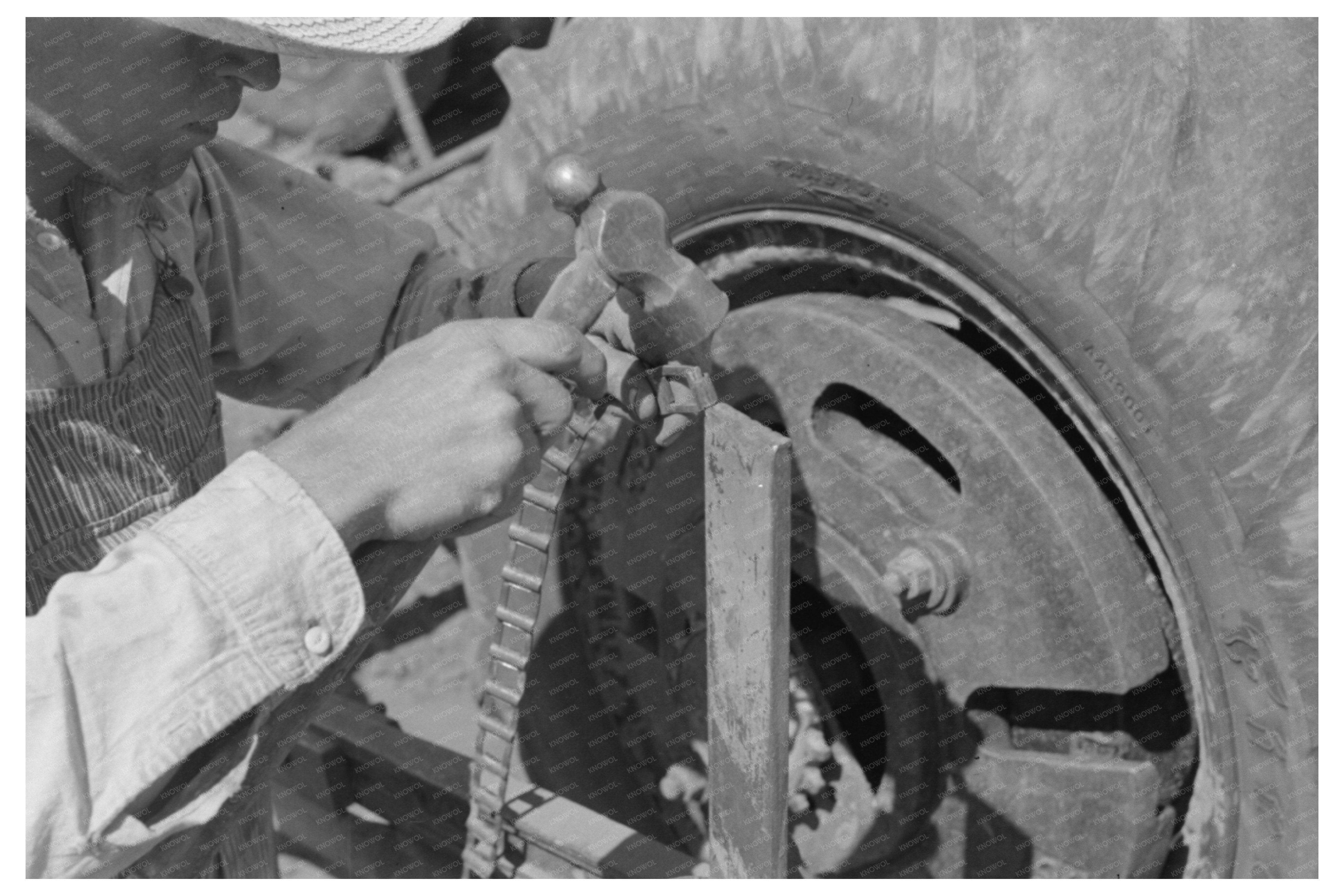 Day Laborer Repairs Chain on Texas Farm May 1939