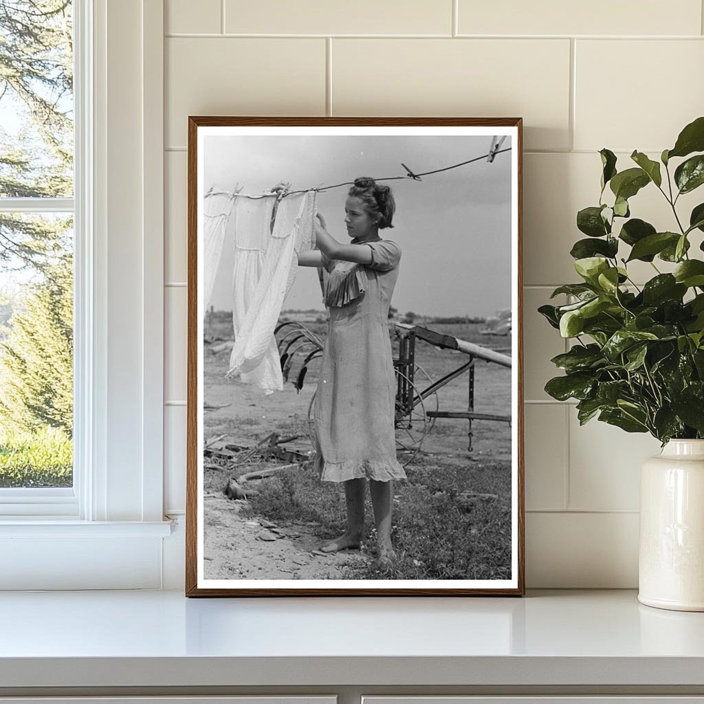 Daughter of Tenant Farmer Hangs Clothes Warner Oklahoma 1939