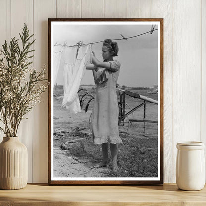 Daughter of Tenant Farmer Hangs Clothes Warner Oklahoma 1939