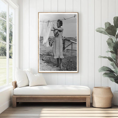 Daughter of Tenant Farmer Hangs Clothes Warner Oklahoma 1939