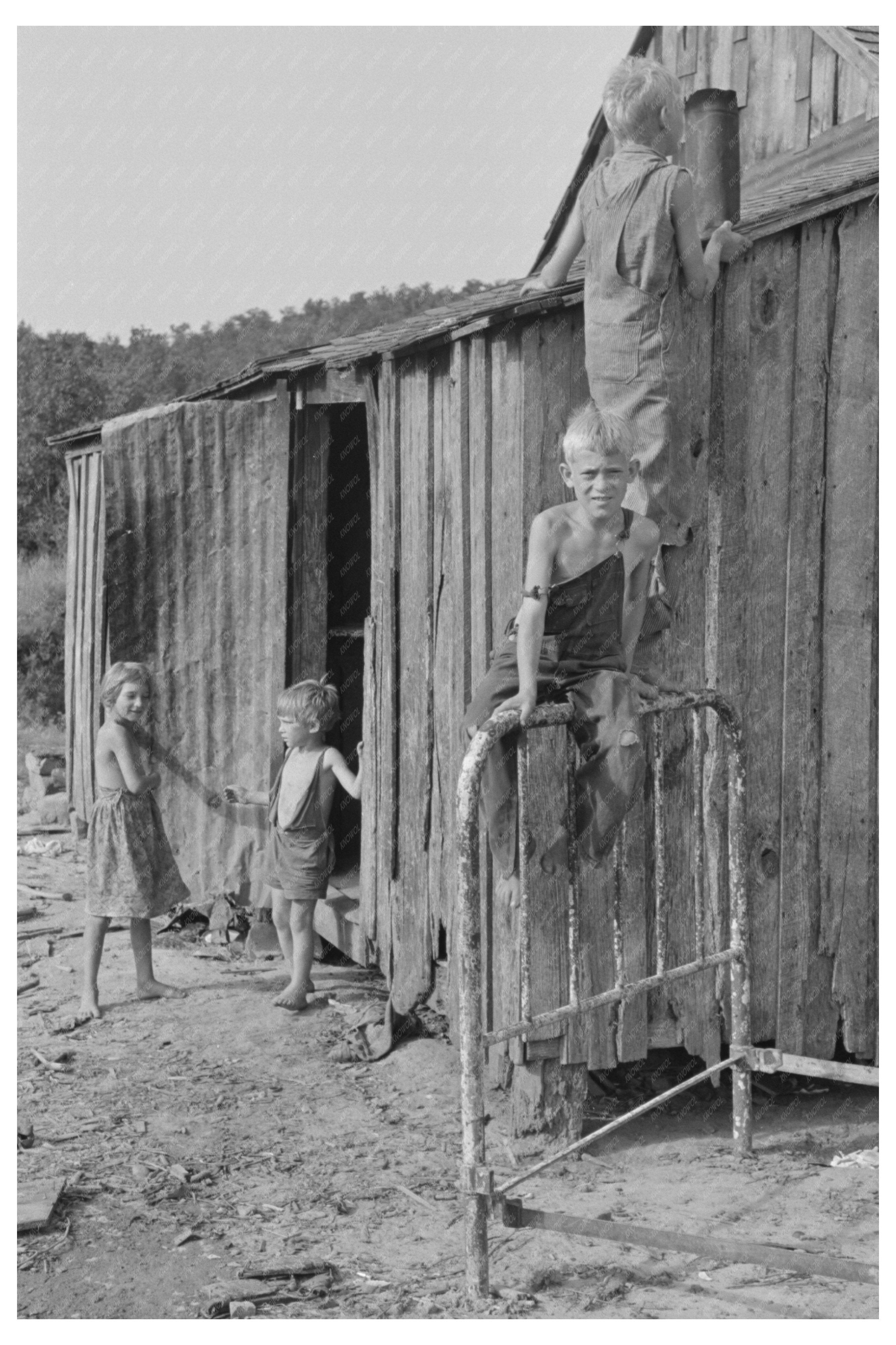 Young Boy Resting on Wheelbarrow McIntosh County 1939