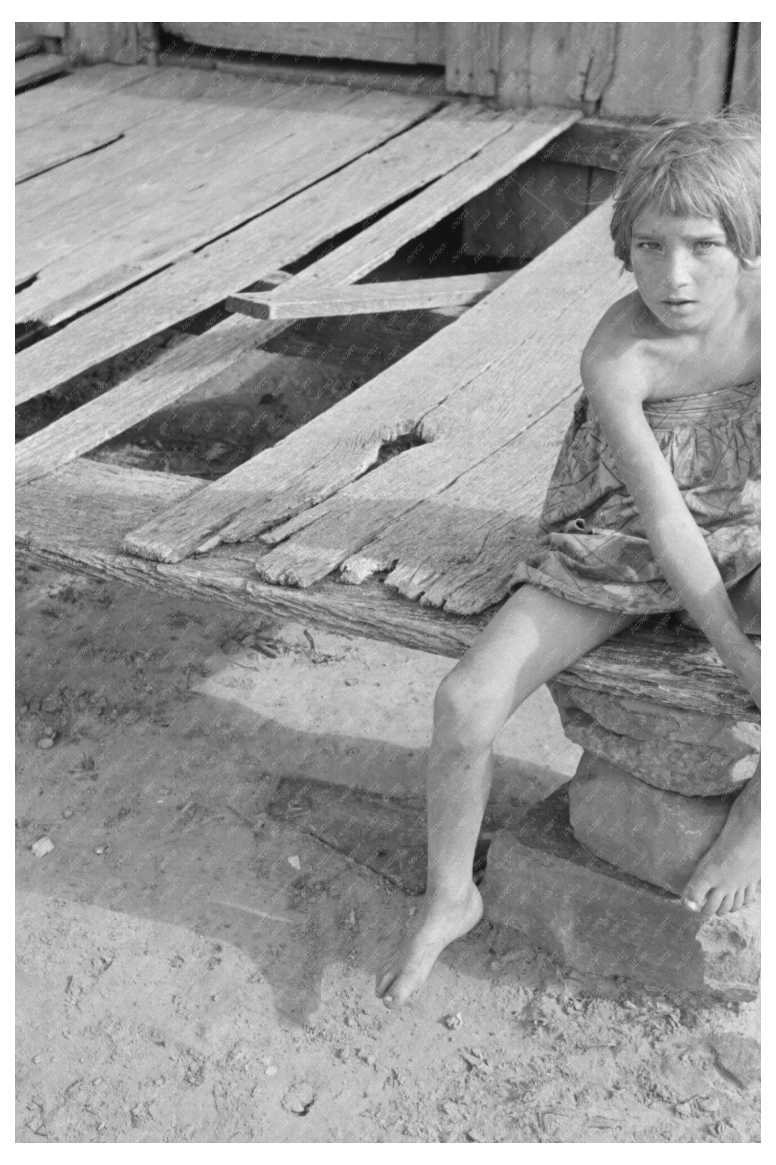 Daughter of Laborer on Porch McIntosh County 1939