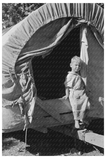 Young Boy Exiting Covered Wagon in Oklahoma 1939