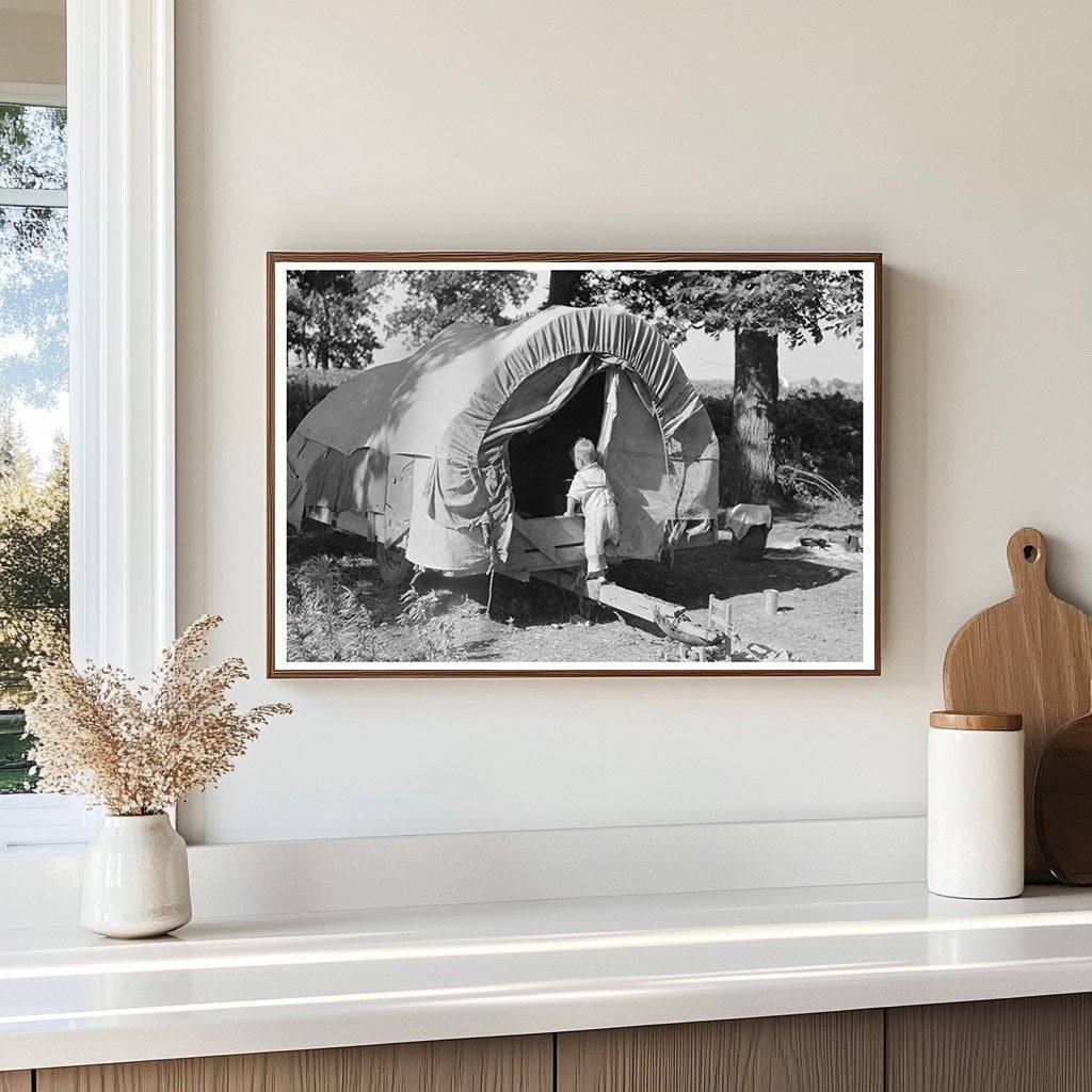 Child of Migrant Entering Covered Wagon Oklahoma 1939