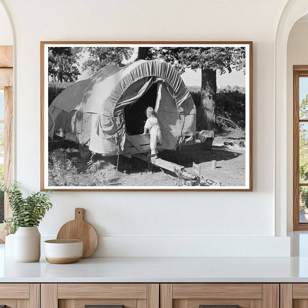 Child of Migrant Entering Covered Wagon Oklahoma 1939