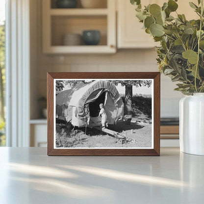 Child of Migrant Family in Covered Wagon 1939