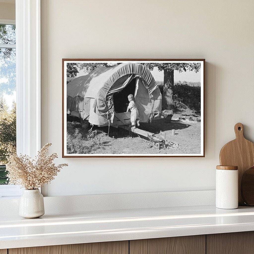 Child of Migrant Family in Covered Wagon 1939