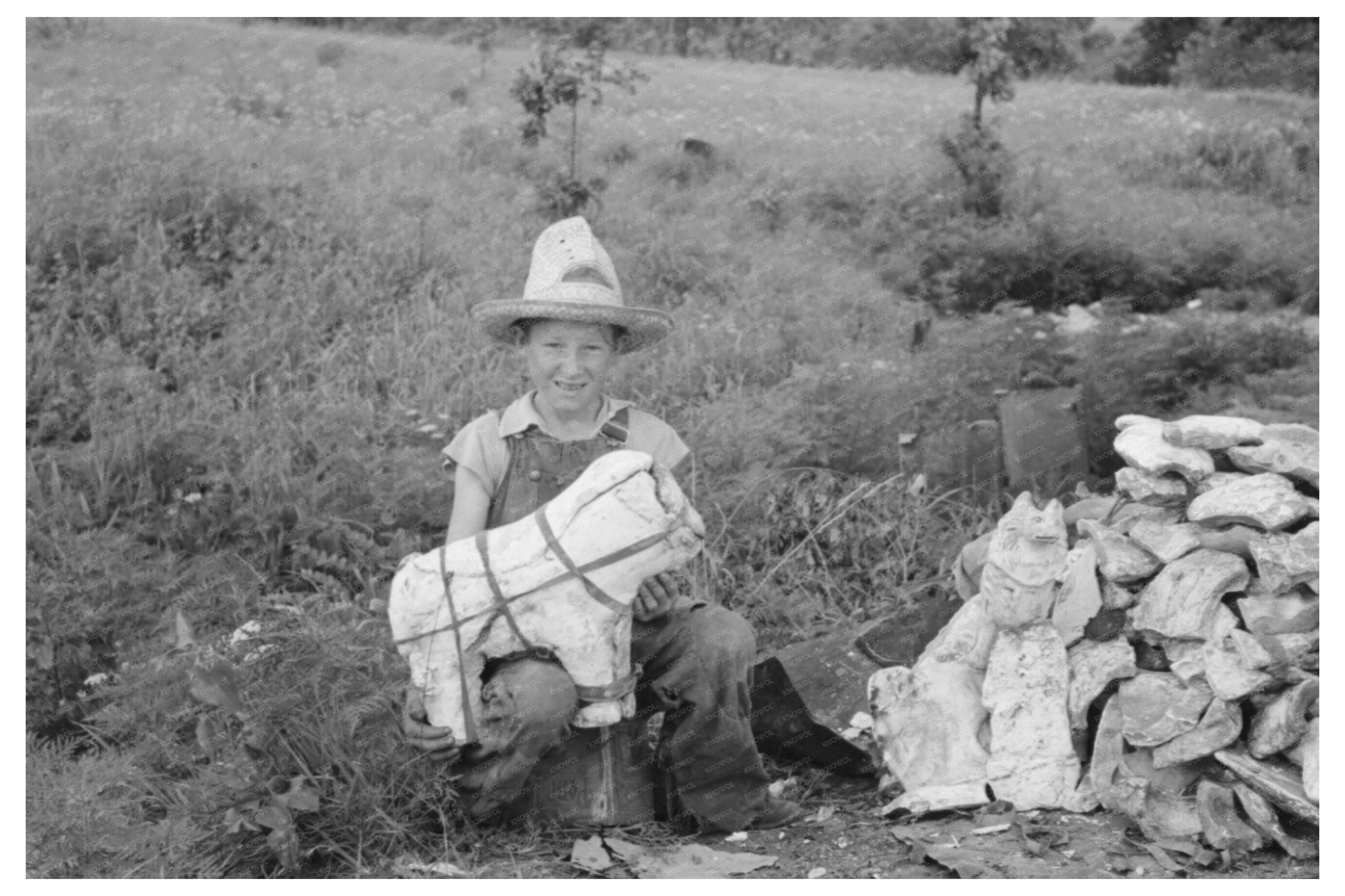 Child of Itinerant Statue Maker in Sequoyah County 1939