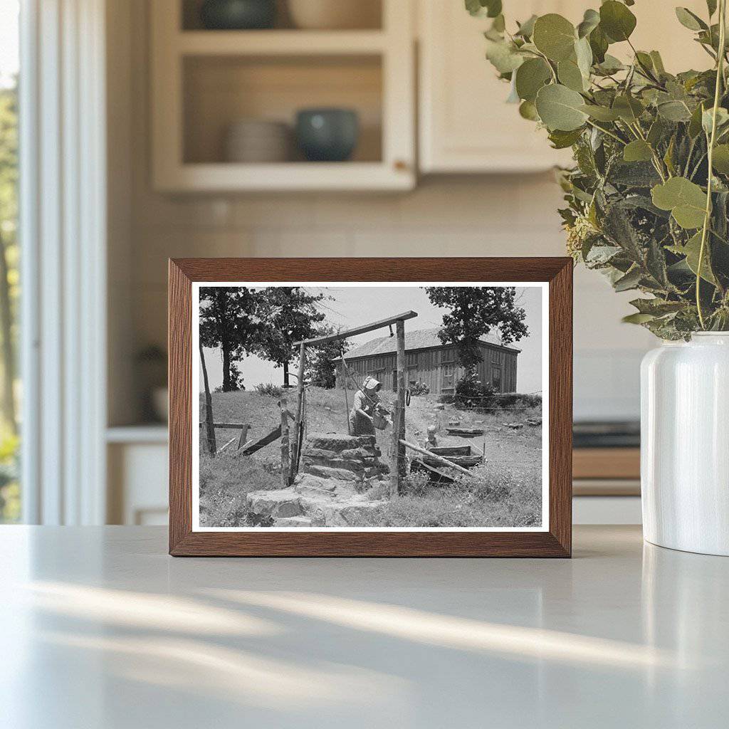 Tenant Farmer Drawing Water in Sallisaw Oklahoma 1939