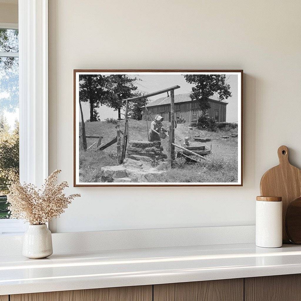 Tenant Farmer Drawing Water in Sallisaw Oklahoma 1939