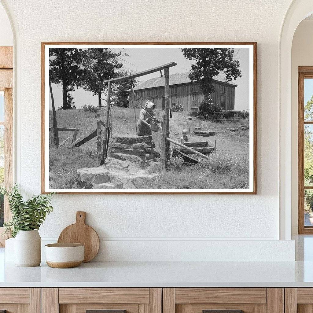 Tenant Farmer Drawing Water in Sallisaw Oklahoma 1939