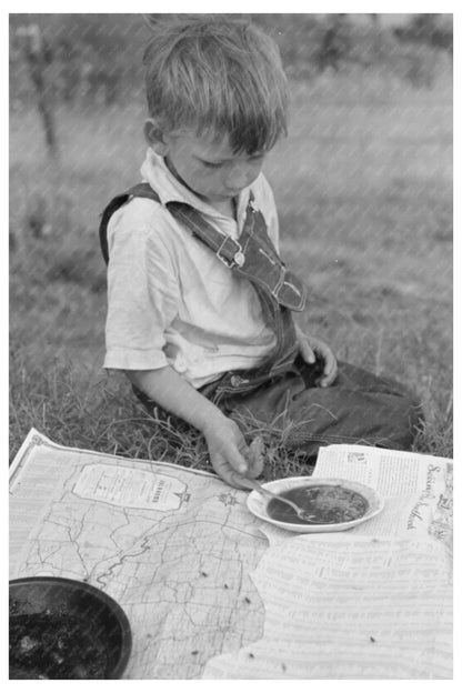 Migrant Child Eating Lunch on Highway Oklahoma 1939