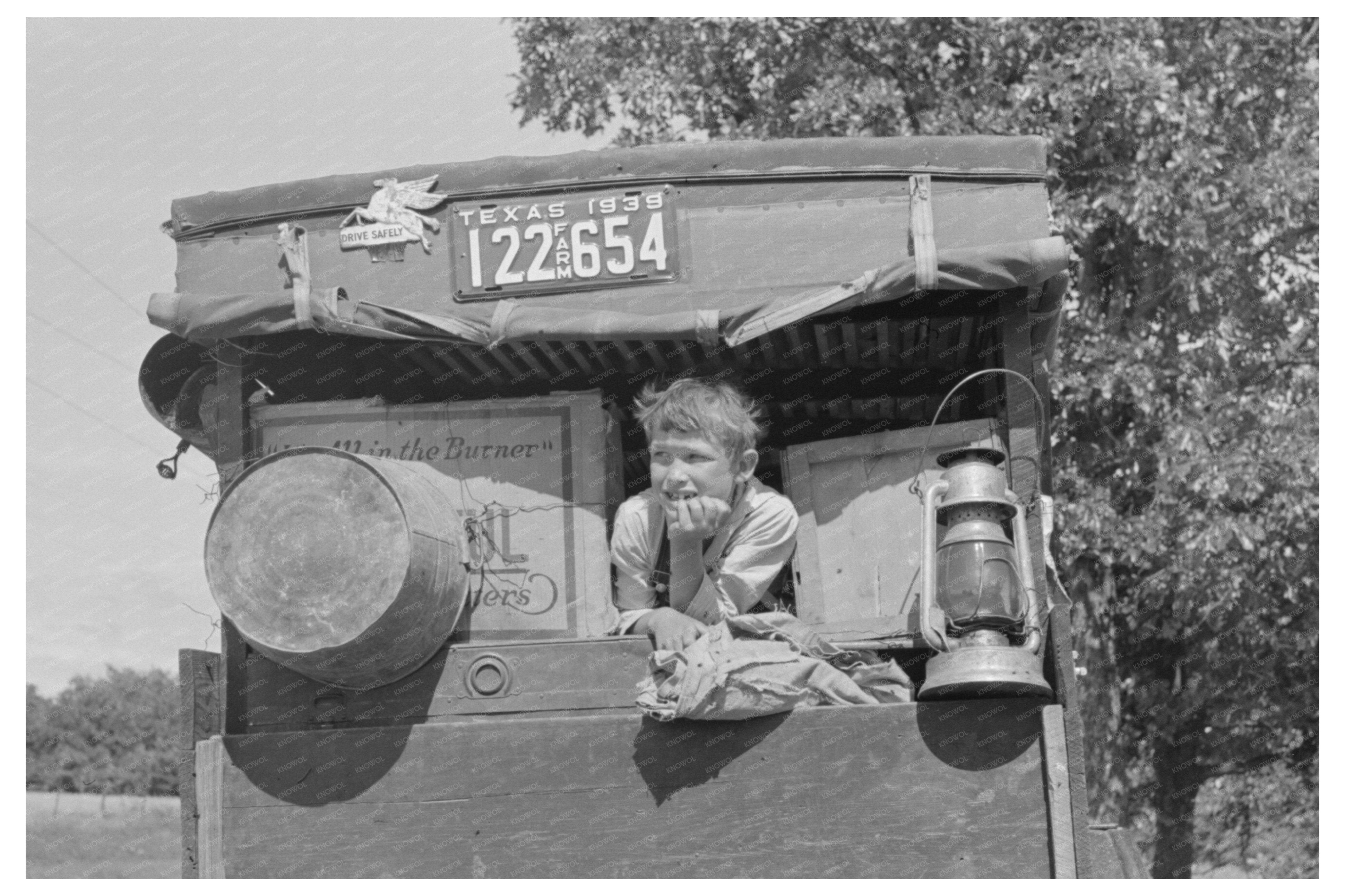 Migrant Child in Family Car Oklahoma June 1939