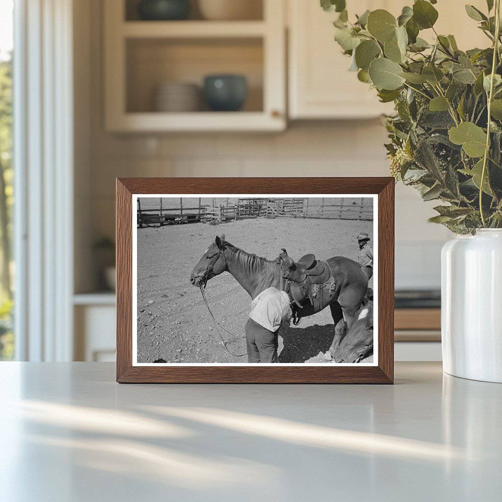 Cowboy Saddling Horse in Marfa Texas May 1939