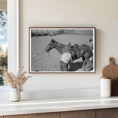 Cowboy Saddling Horse in Marfa Texas May 1939