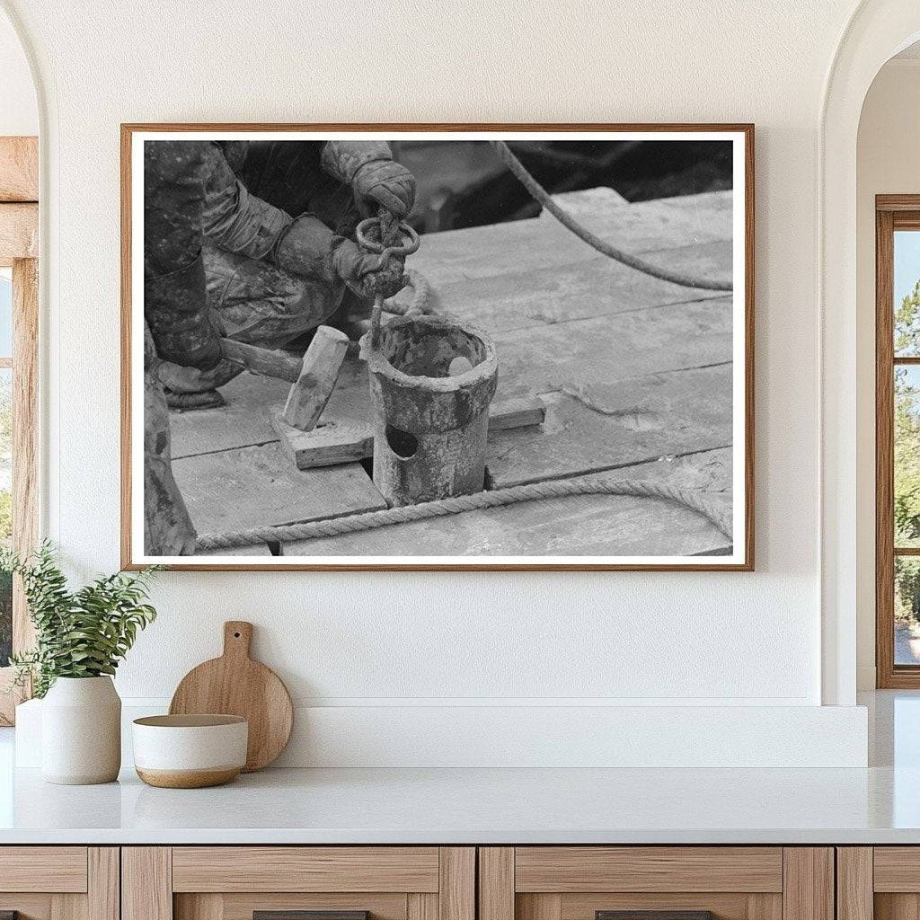 Roughnecks Guiding Bailer at Oil Well August 1939