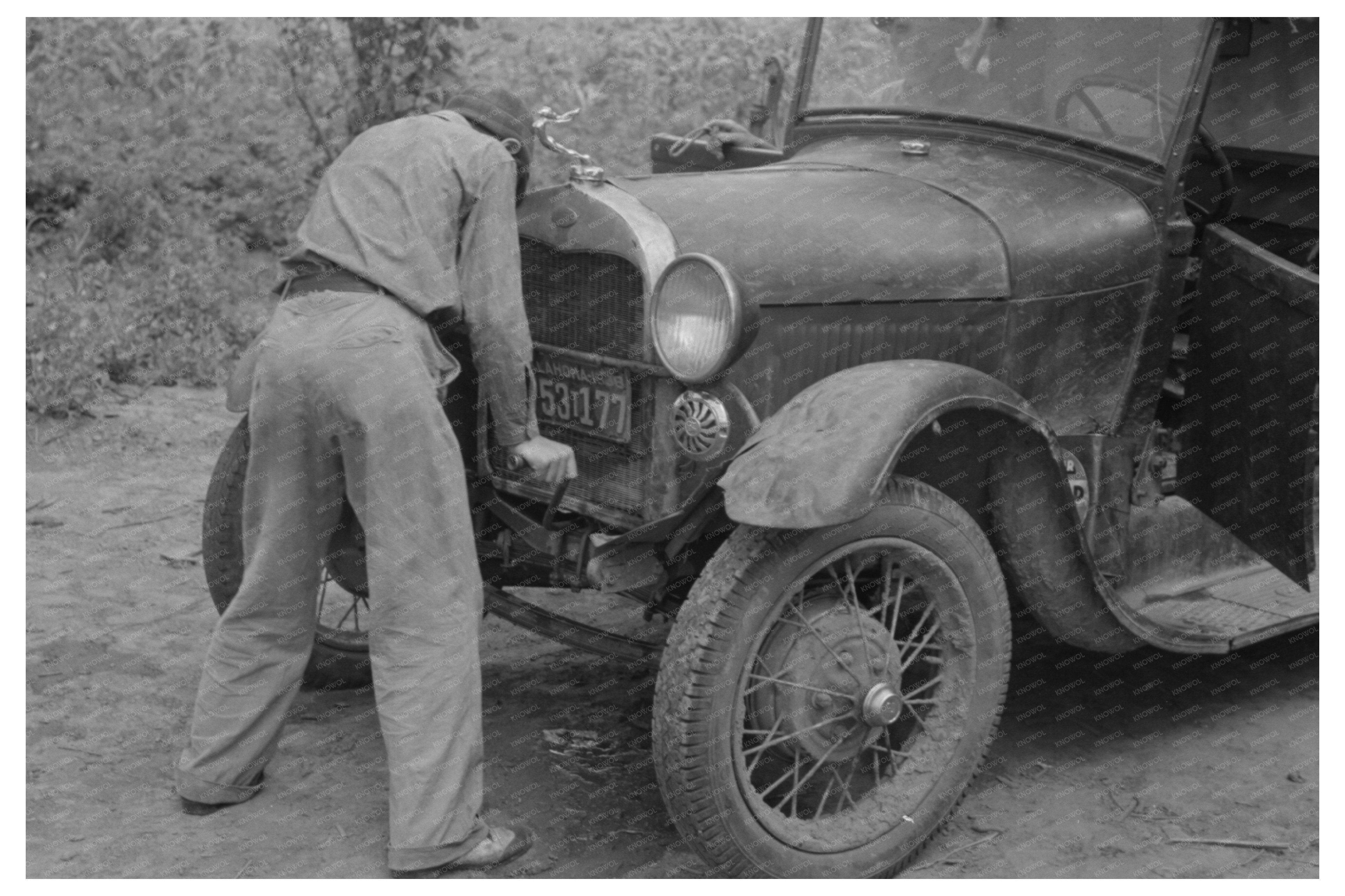 Migrant Boy Starting Car Muskogee Oklahoma 1939