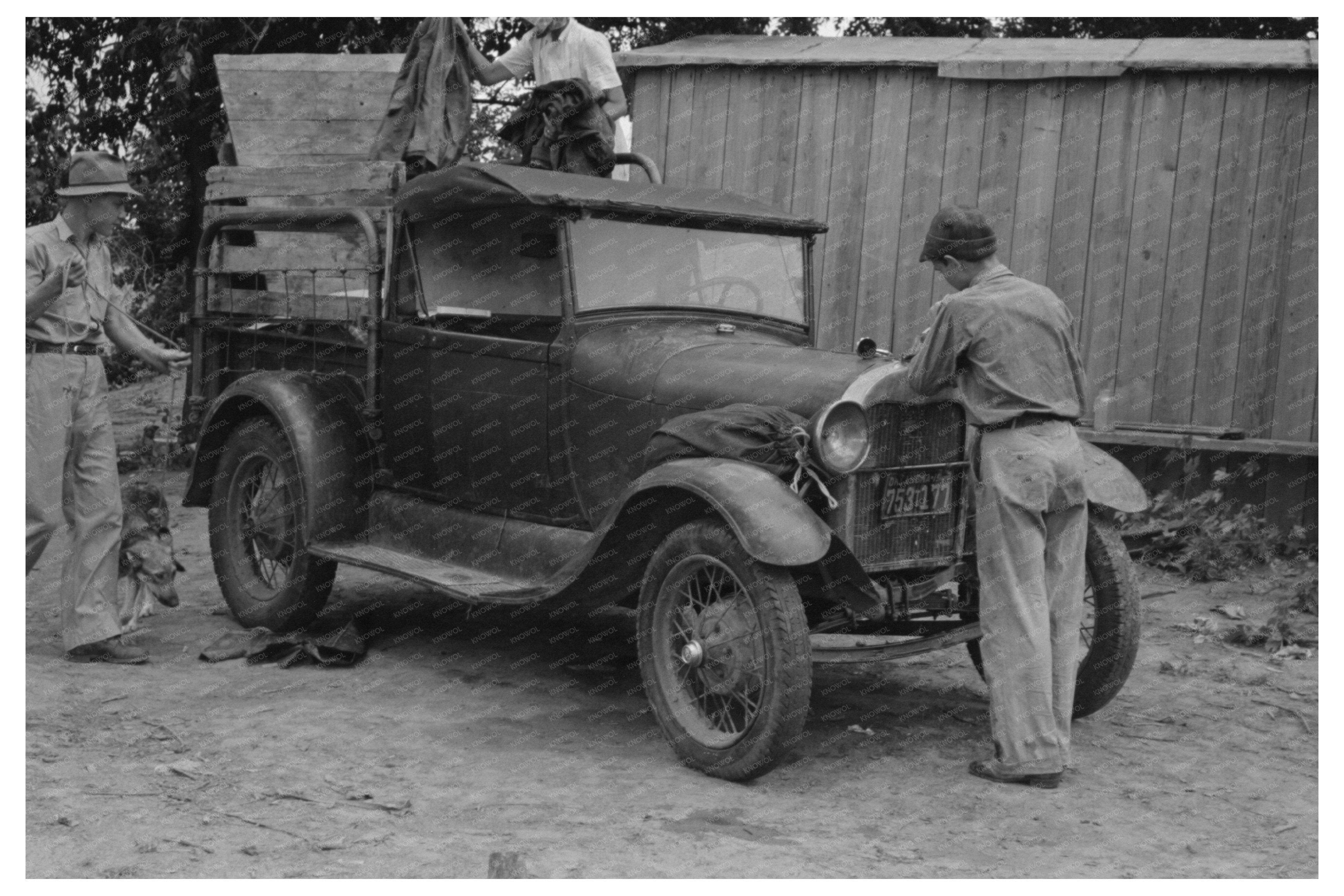 Young Boy Cranking Car in Muskogee Oklahoma 1939