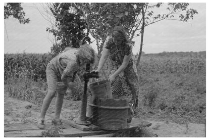 Elmer Thomas Family Daughters Pumping Water Oklahoma 1939