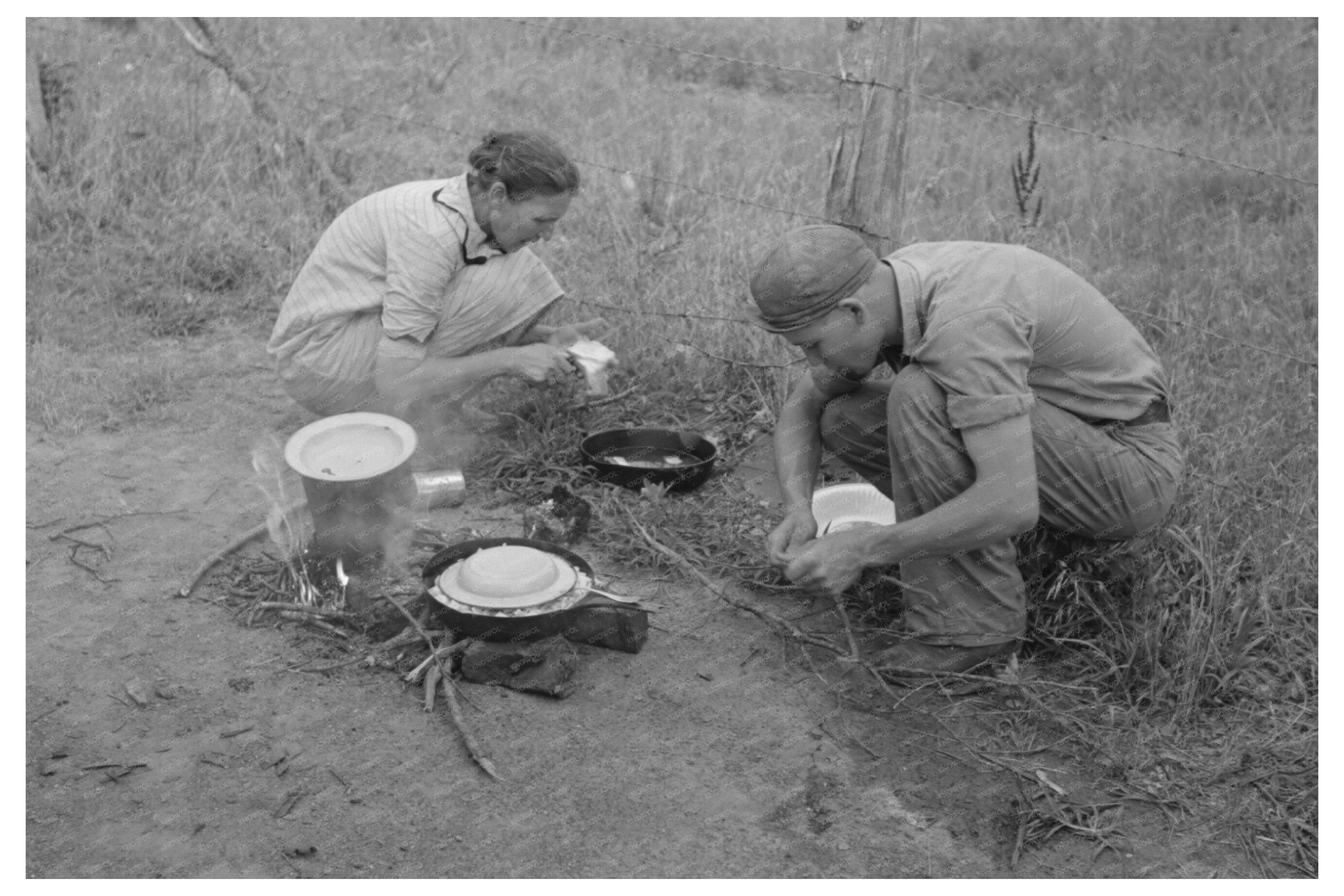 Migrant Family Preparing Food in Oklahoma July 1939