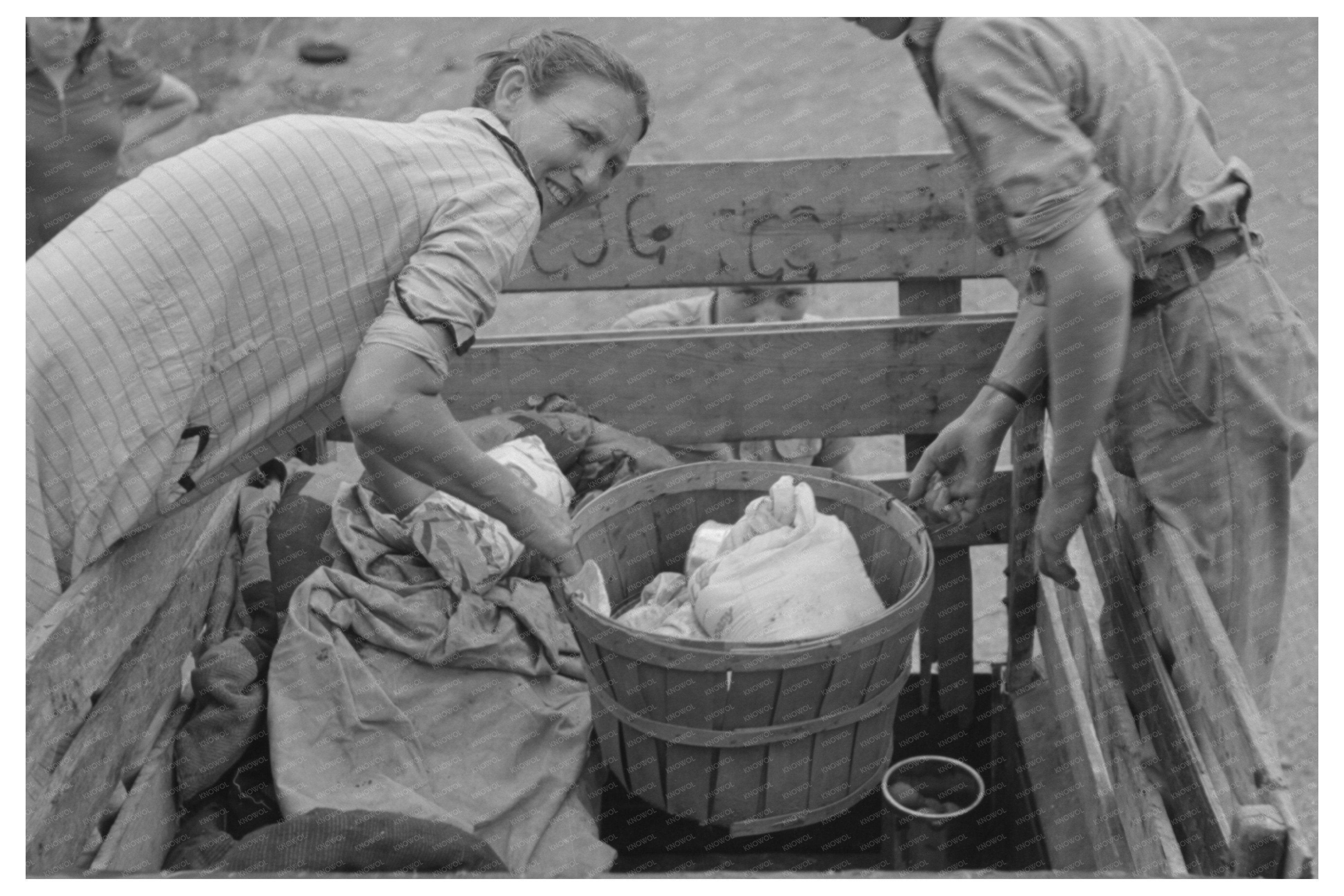 Elmer Thomas Family Unloading Food July 1939